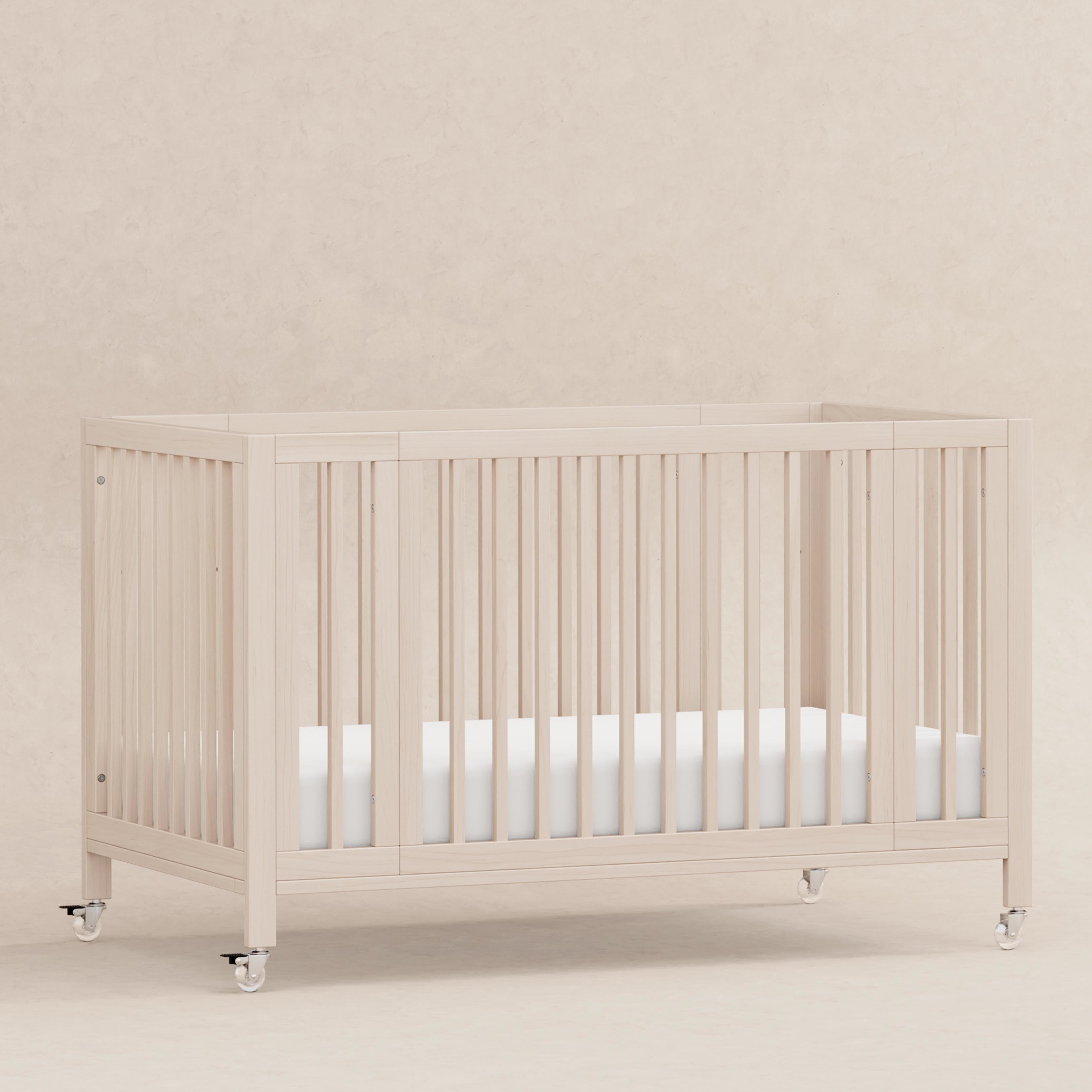 Rolli 9-in-1 Convertible All-Stages® Crib with Bassinet & Toddler Bed Conversion Kits