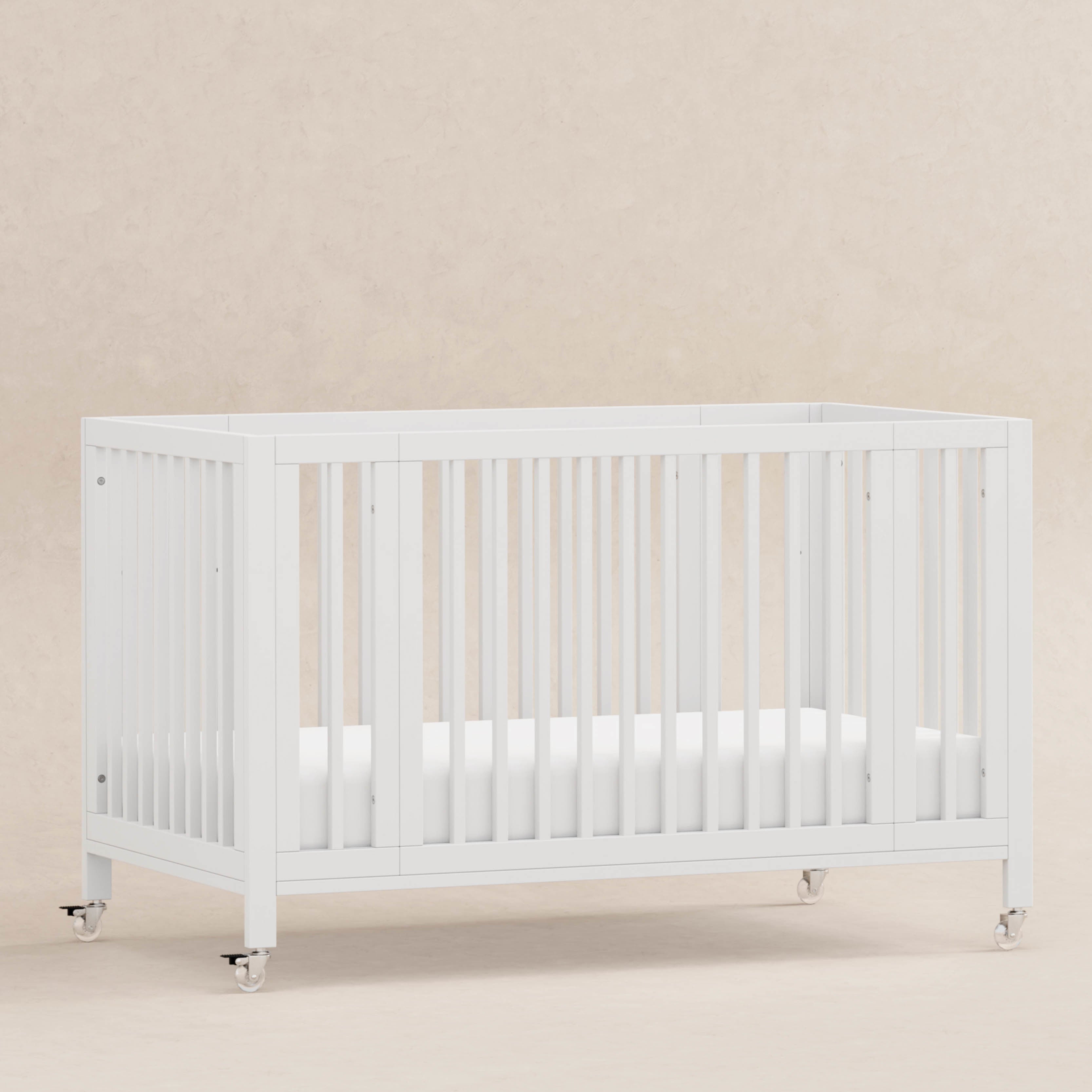 Rolli 9-in-1 Convertible All-Stages® Crib with Bassinet & Toddler Bed Conversion Kits